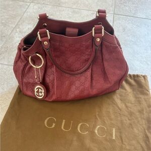 Gucci Sukey (red) embossed GG